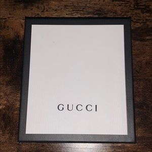 Gucci Signature Bi-Fold Wallet